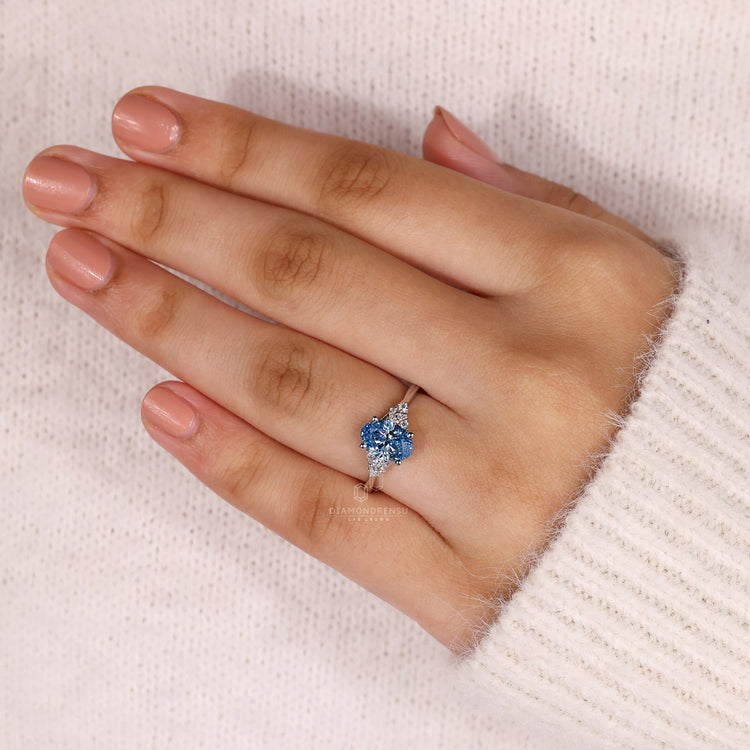 Muse setting diamond ring with IGI certified lab diamond centre.