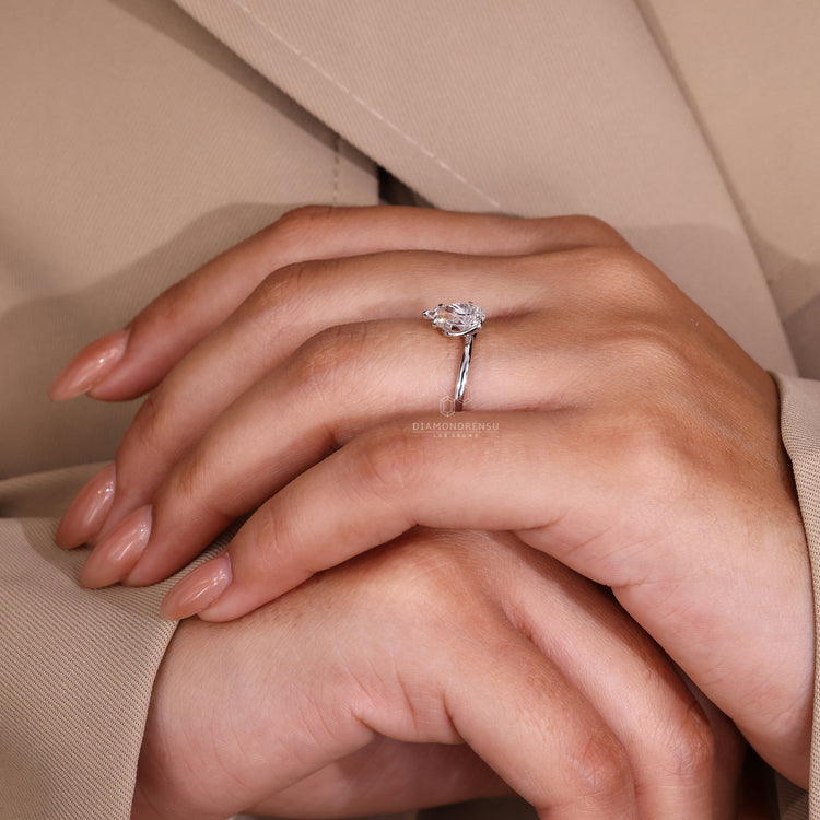 White gold engagement ring featuring a twisted prong setting.