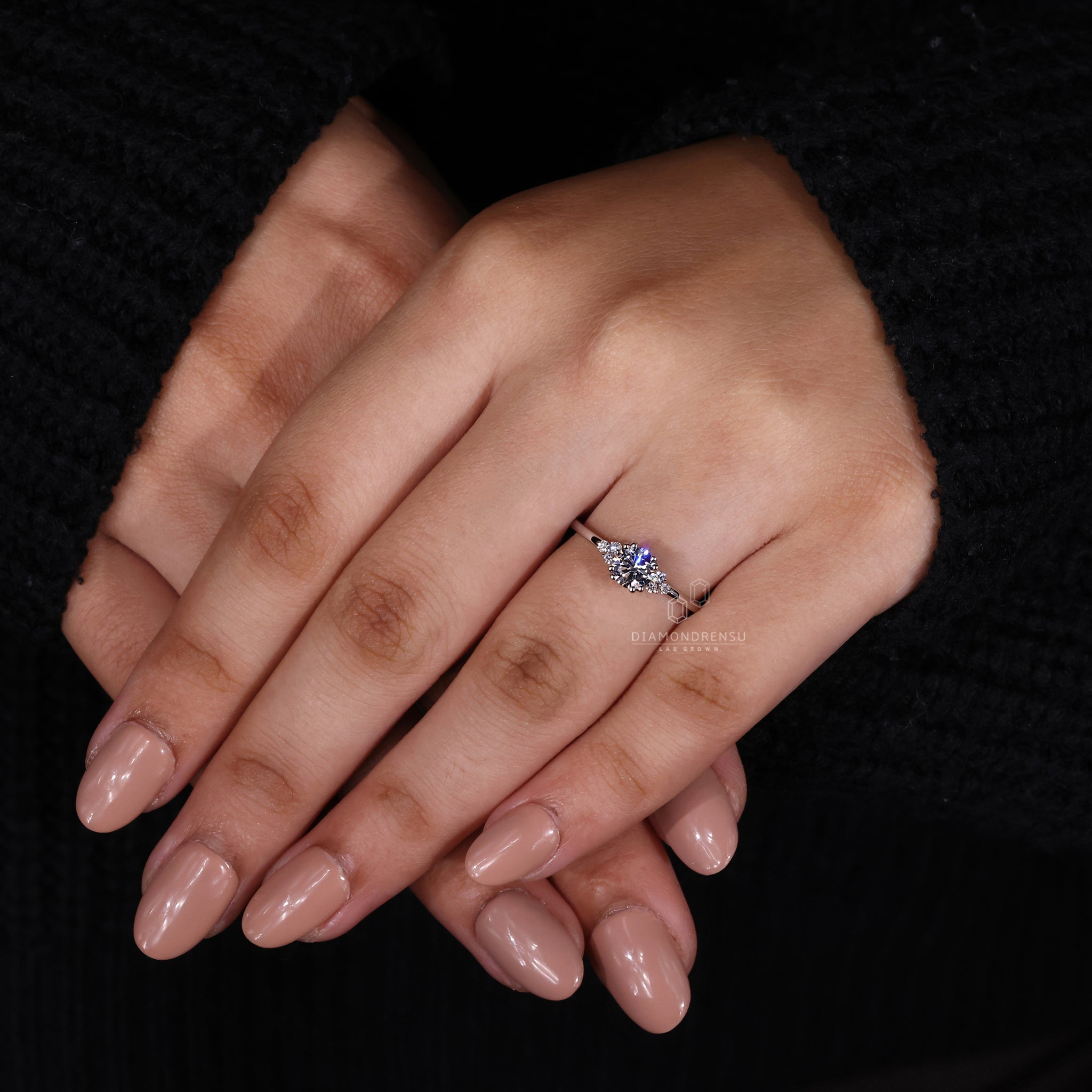 Proposal engagement ring with white gold minimalist muse setting ring.