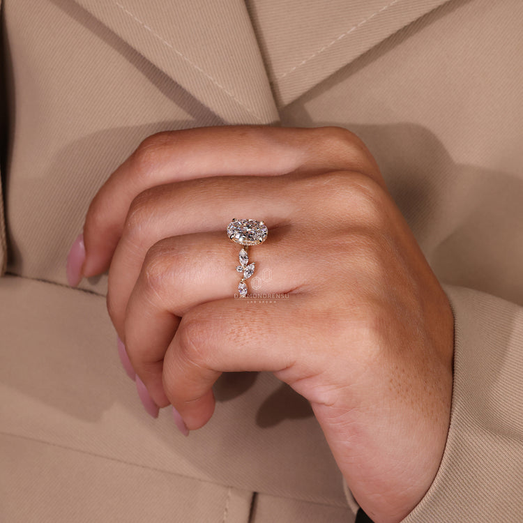 Oval ring with side stones in side stone marquise diamond ring