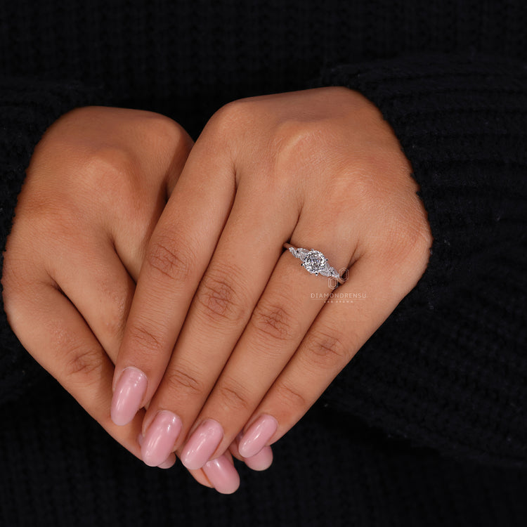 Nature inspired engagement ring with leaf ascent ring and peekaboo detail.