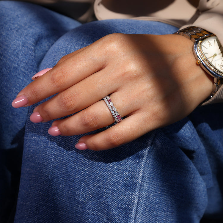 Double row pave band with prong set lab grown diamonds.