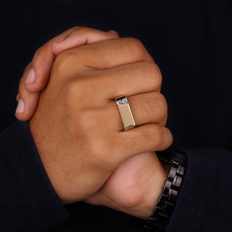 Handmade mens ring designed in yellow gold with a bold signet style.