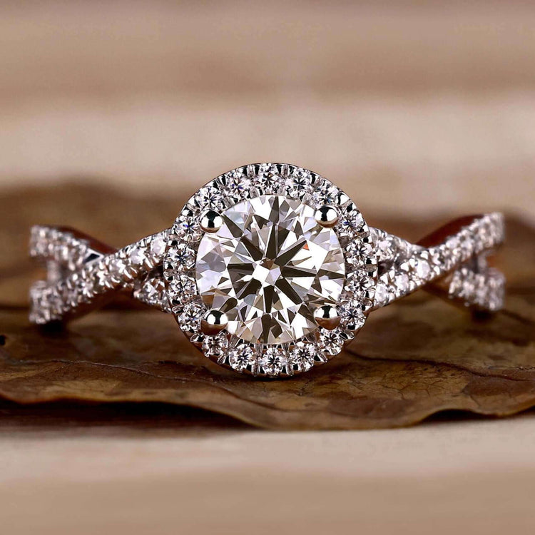 Elegant twisted diamond ring with a modern design.