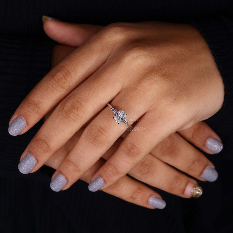 White gold engagement ring in a unique three stone setting.
