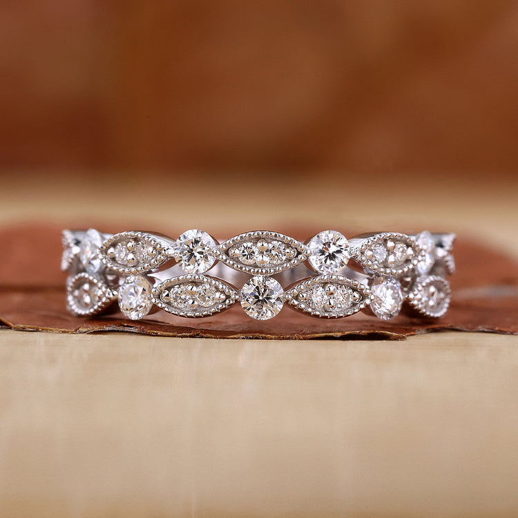 Milgrain wedding band with round diamond eternity design