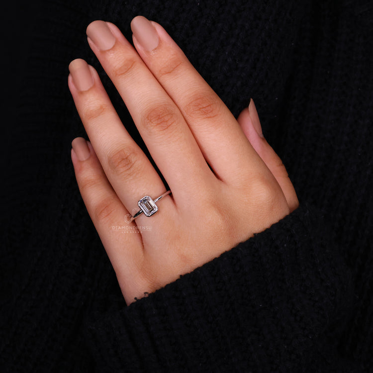 Bezel setting ring crafted in elegant white gold.