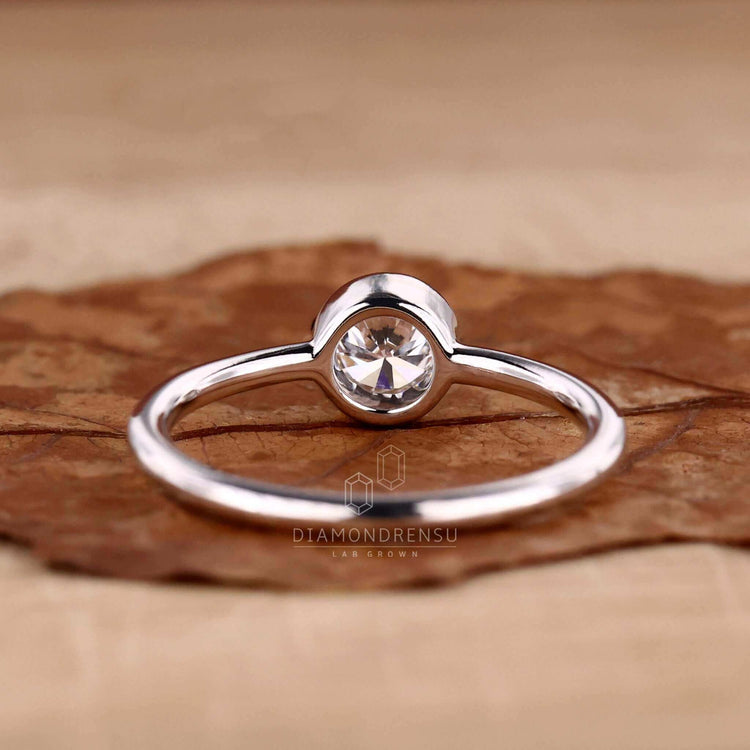 Bezel set ring with exquisite craftsmanship and elegance.