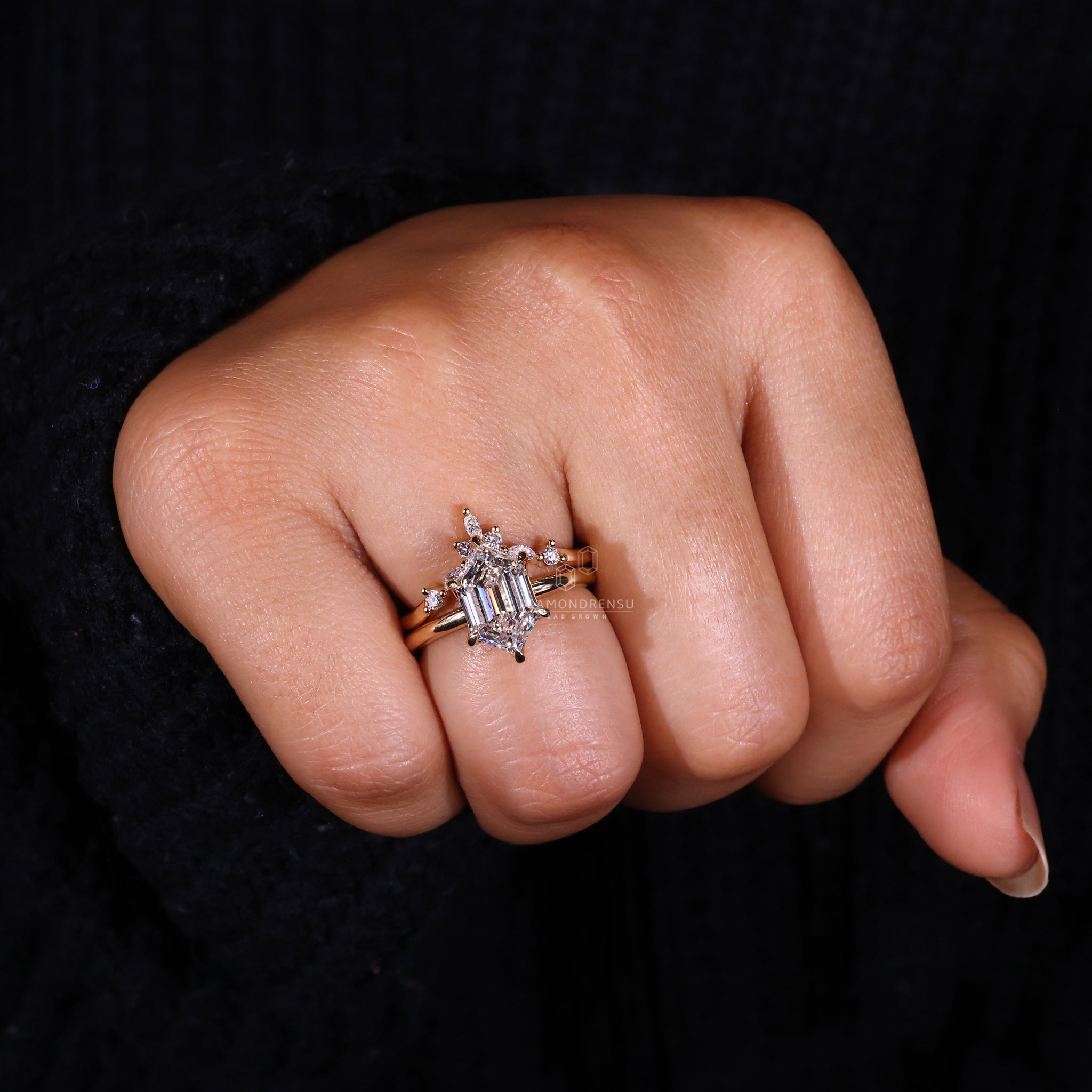 6 prong claw setting ring with marquise and round diamond band.