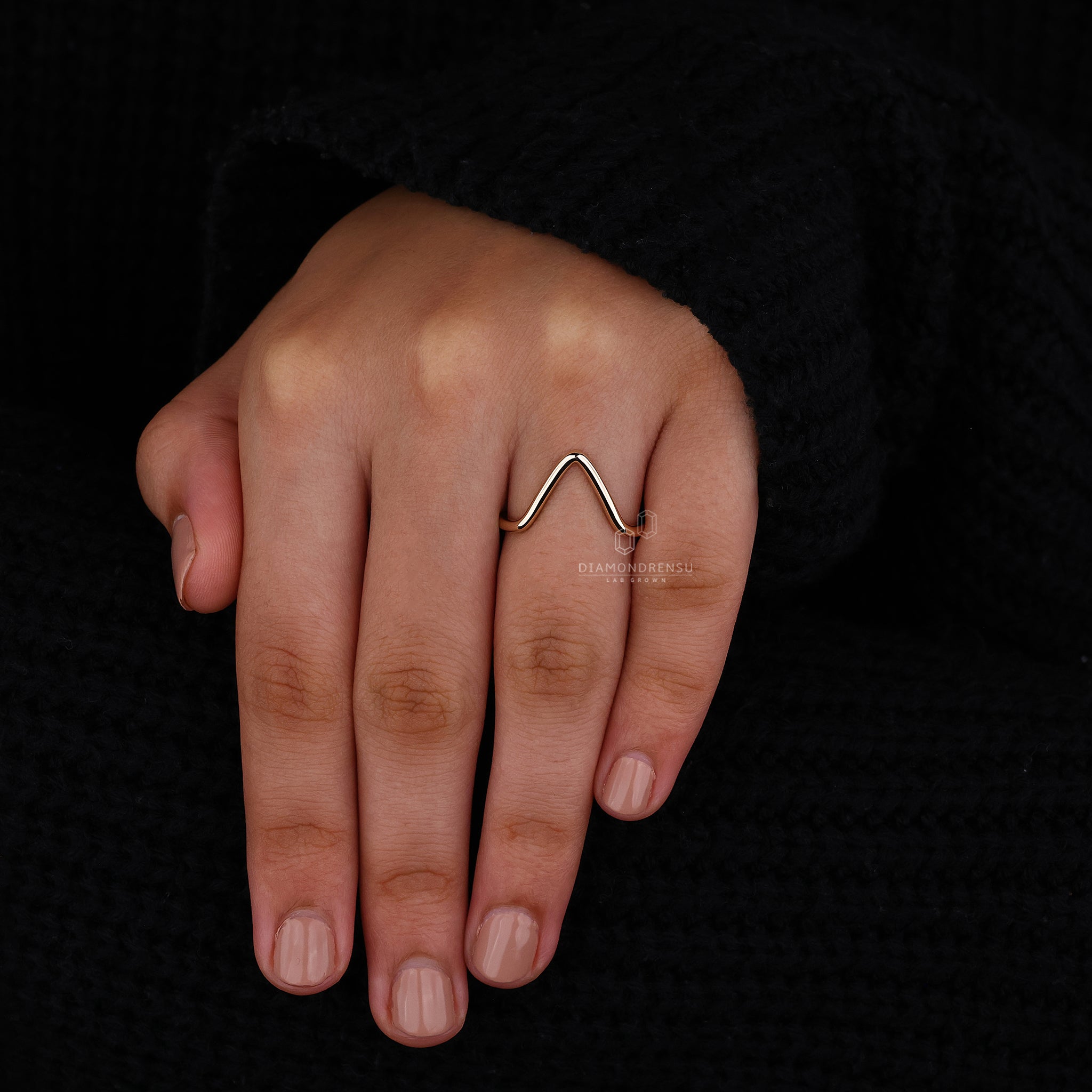 Stylish chevron wedding band perfect for pairing with solitaires.