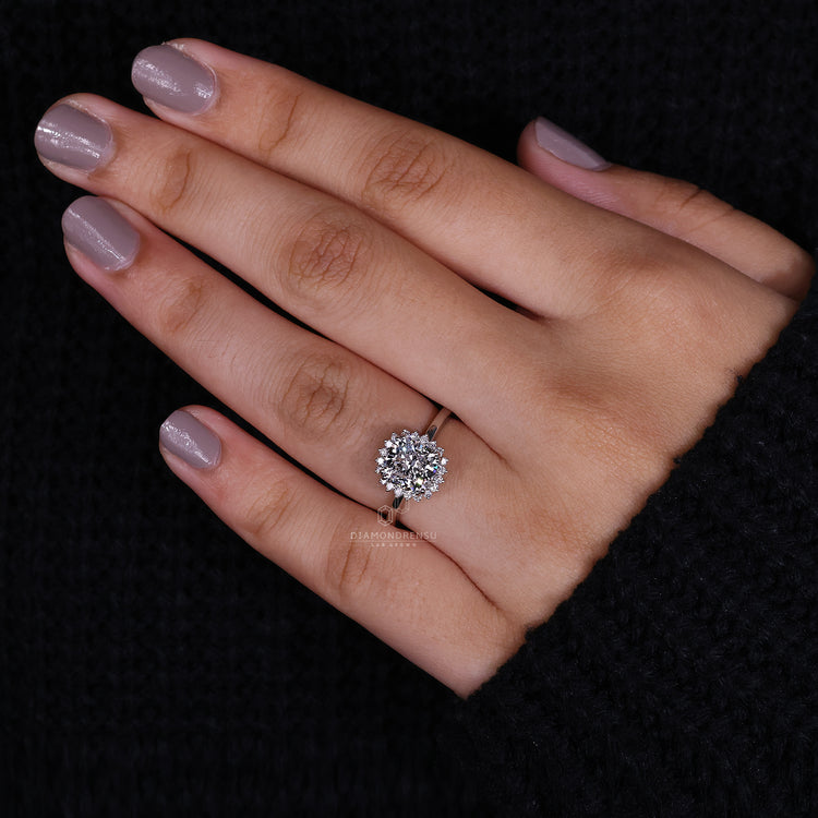 Round diamond ring featuring prong setting