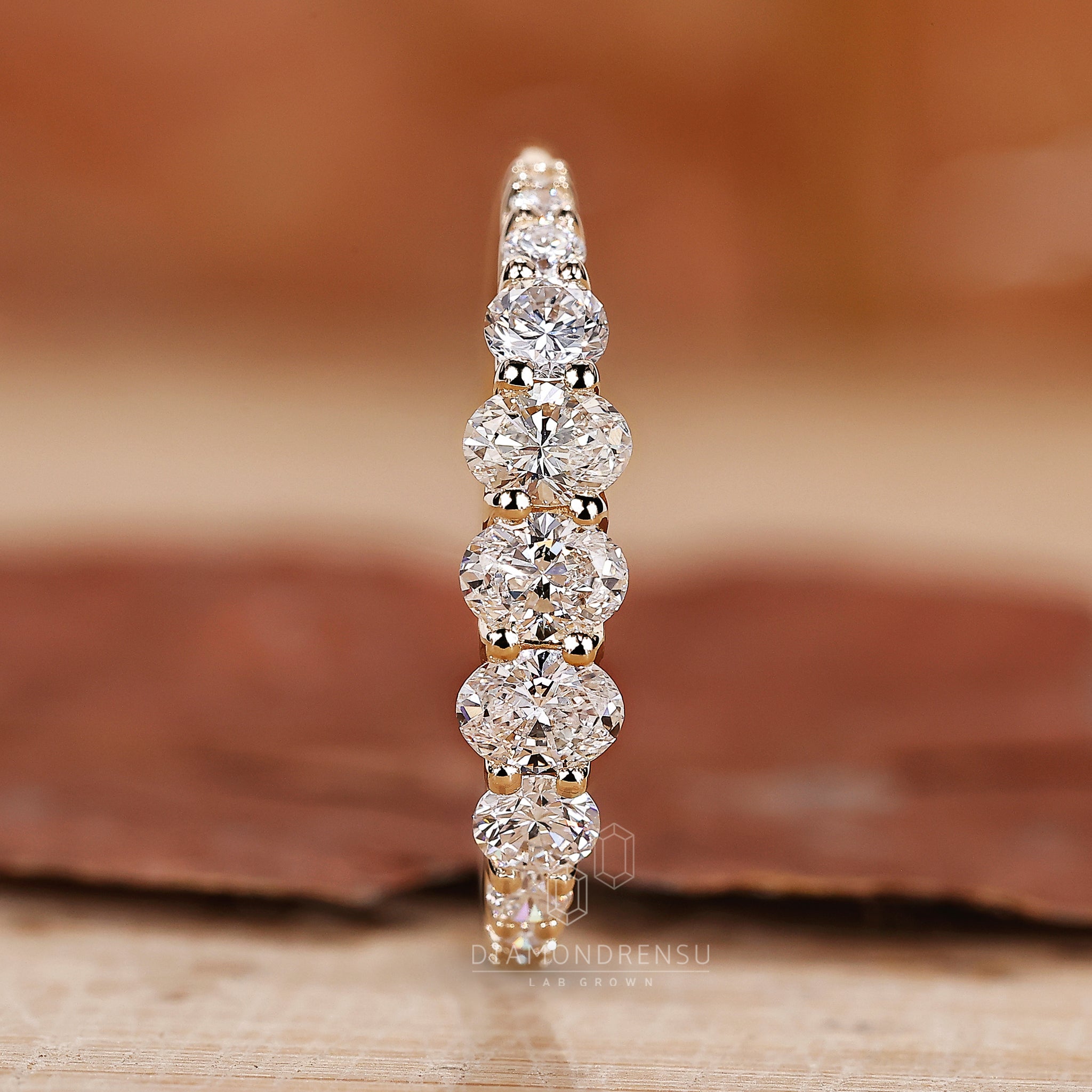 Diamondrensu UK oval diamond wedding band.