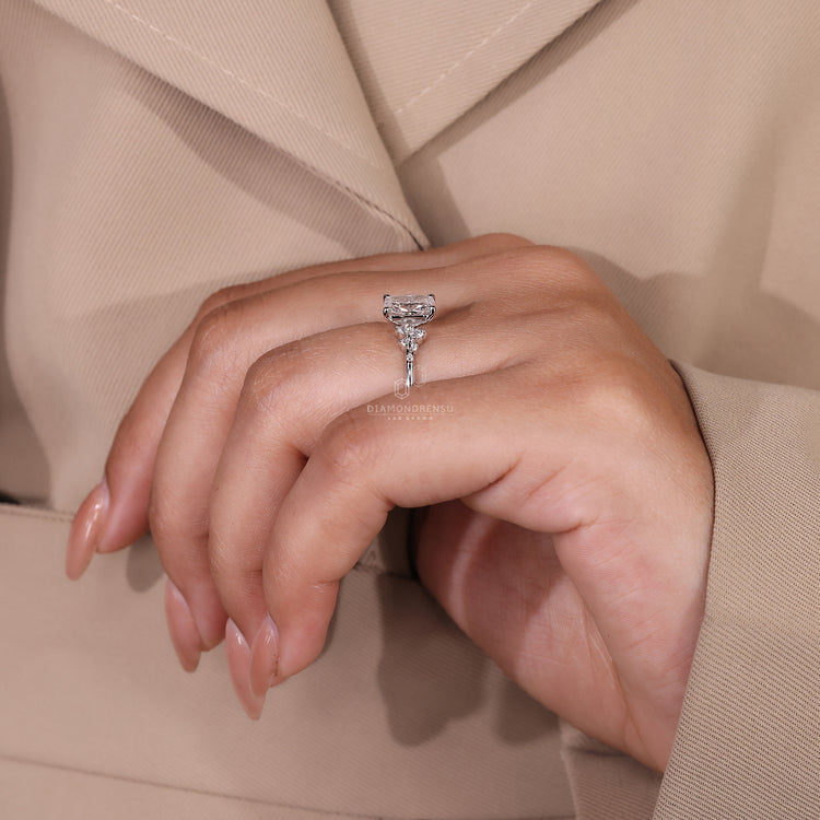 White gold ring with elongated cushion and IGI certified diamond.