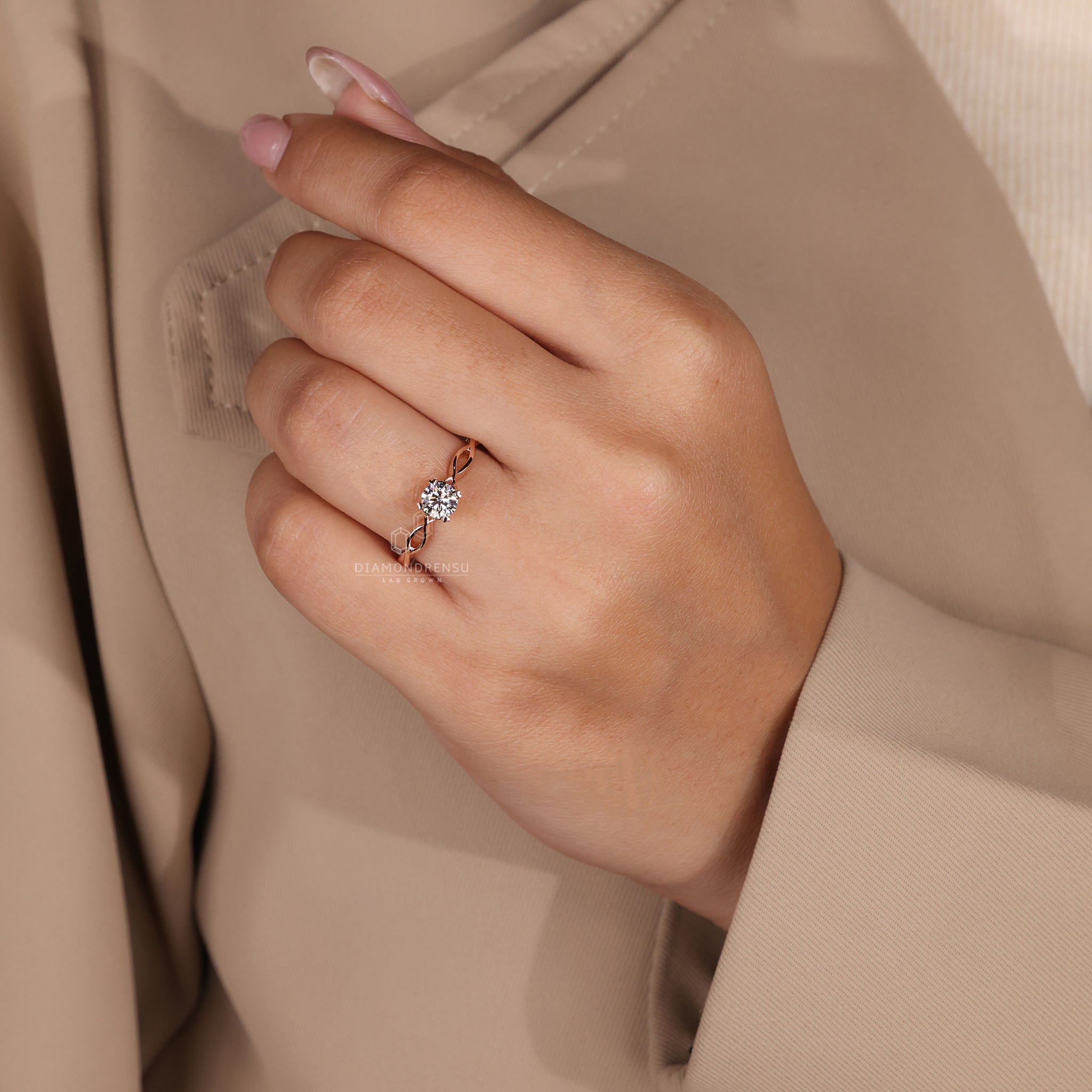 UK engagement ring with round diamond solitaire and hidden heart design.