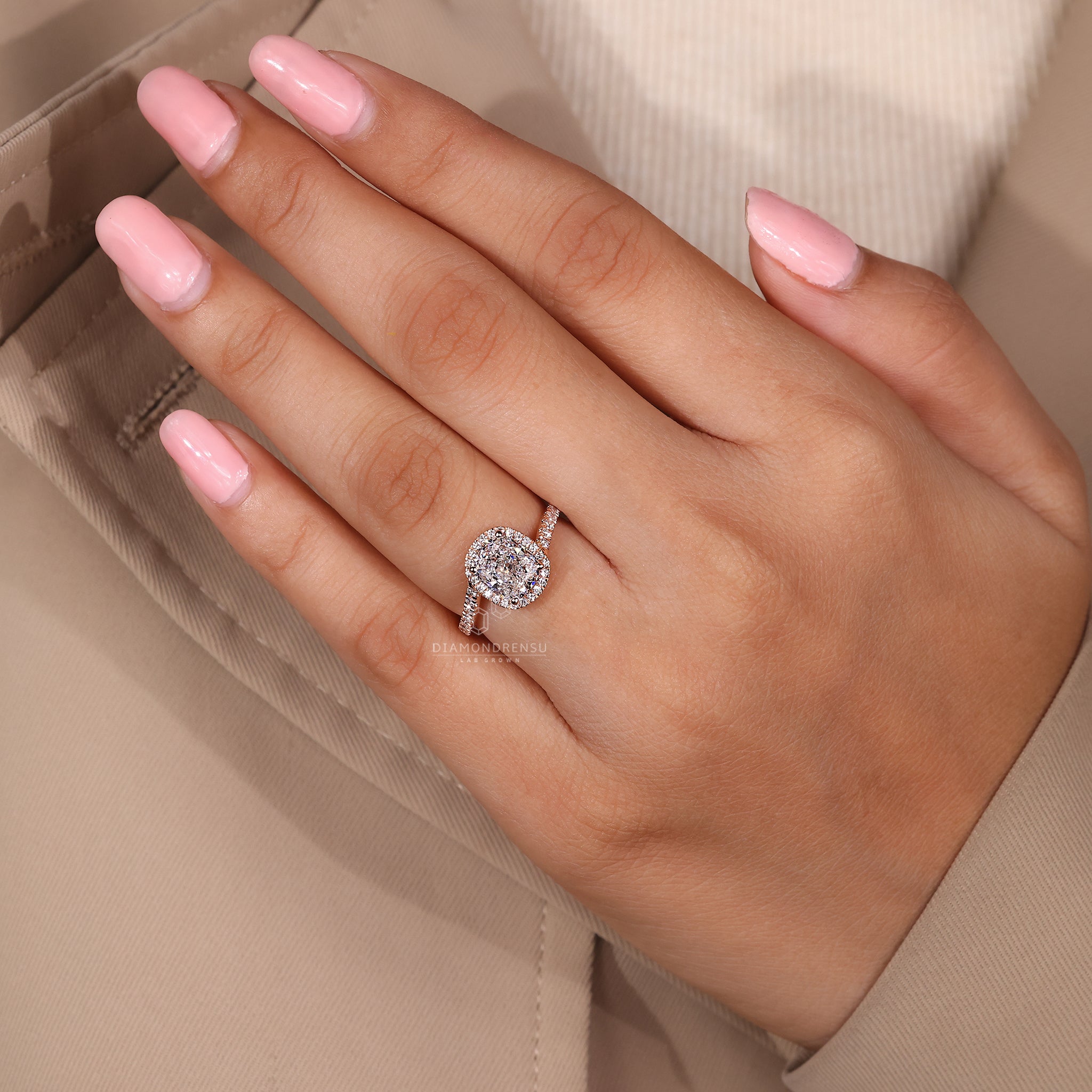 4 prong setting holds cushion cut center securely.