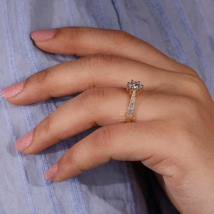 6 prong engagement ring crafted with a lab grown diamond in a yellow gold ring setting.