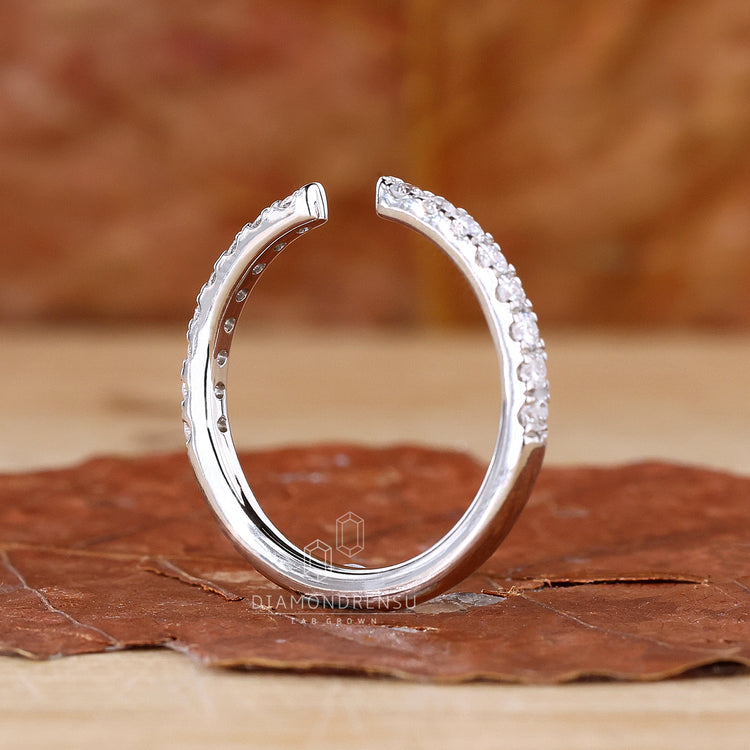 Lab diamond wedding band with semi eternity design.