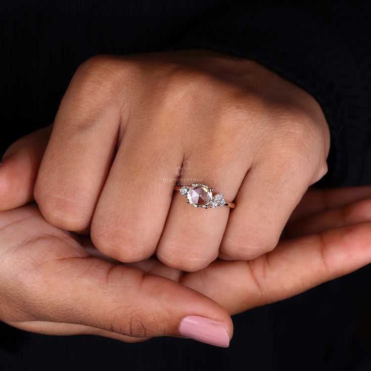 Round rose cut ring is set using 4 prong ring.
