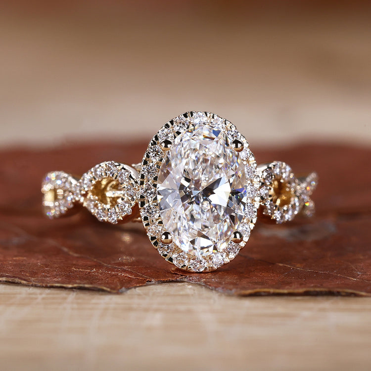 Halo diamond engagement ring in yellow gold.