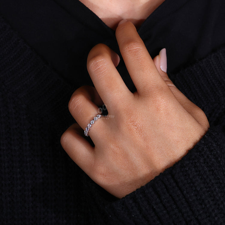 White gold wedding band with vintage diamond cuts.
