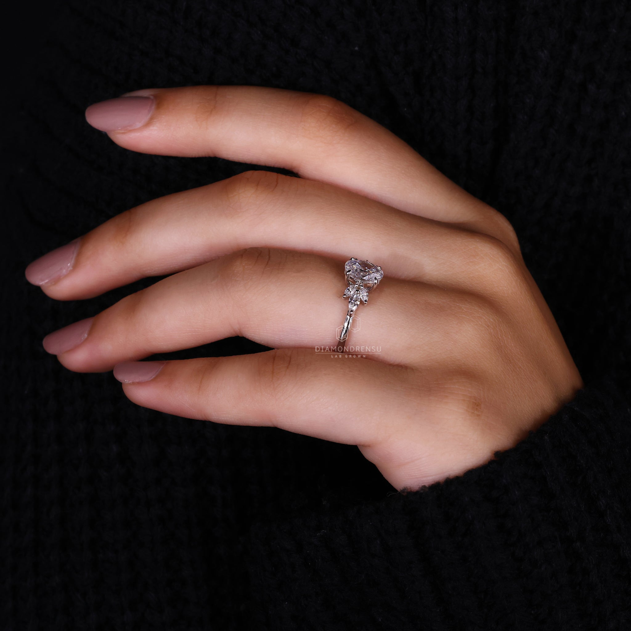 Diamondrensu UK engagement ring with a marquise cut diamond, handmade jewelry, and a beautiful engagement ring UK style.