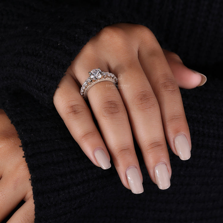Handmade ring with pave setting and lab grown diamond.