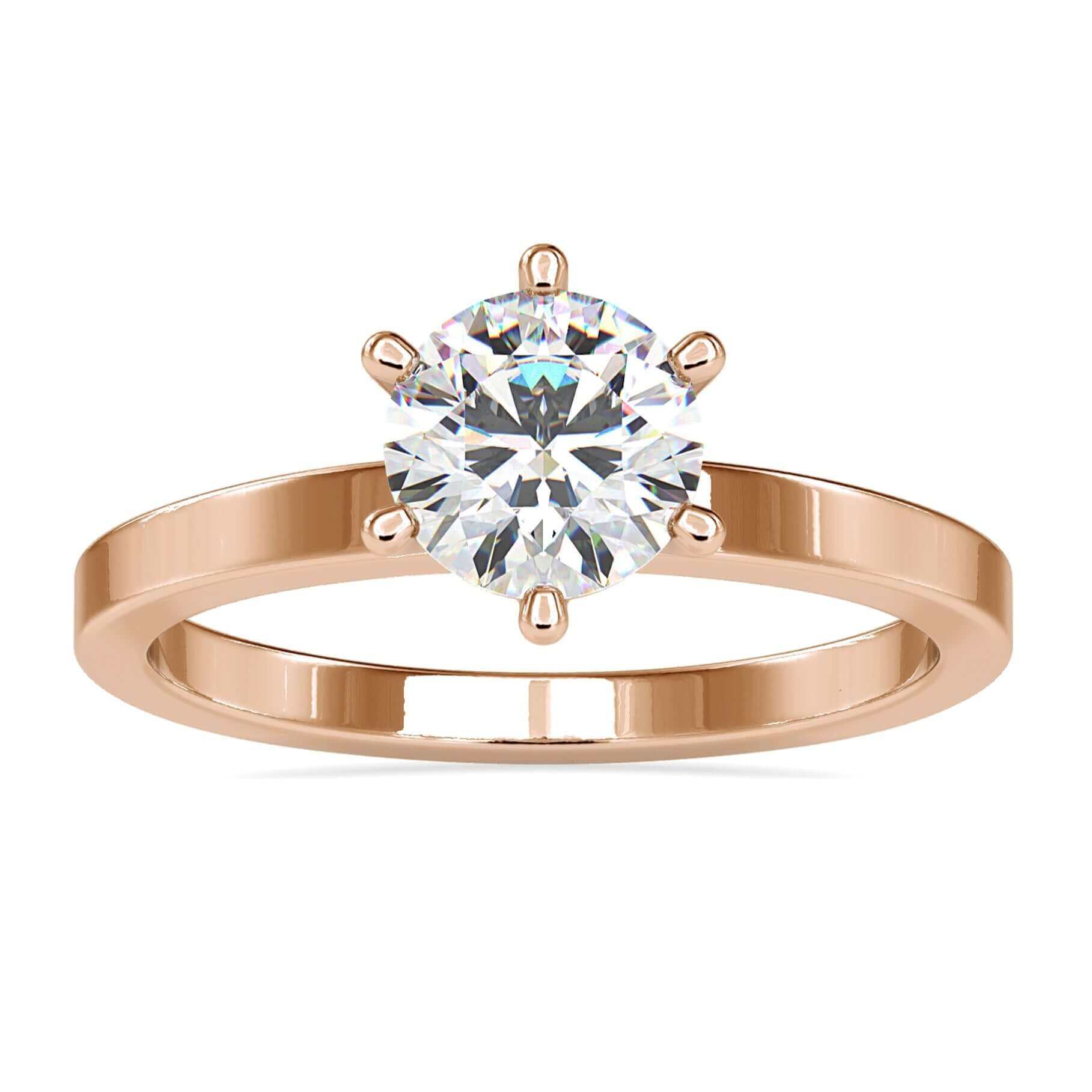 6 prong engagement ring with round diamond in white gold.