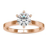 6 prong engagement ring with round diamond in white gold.