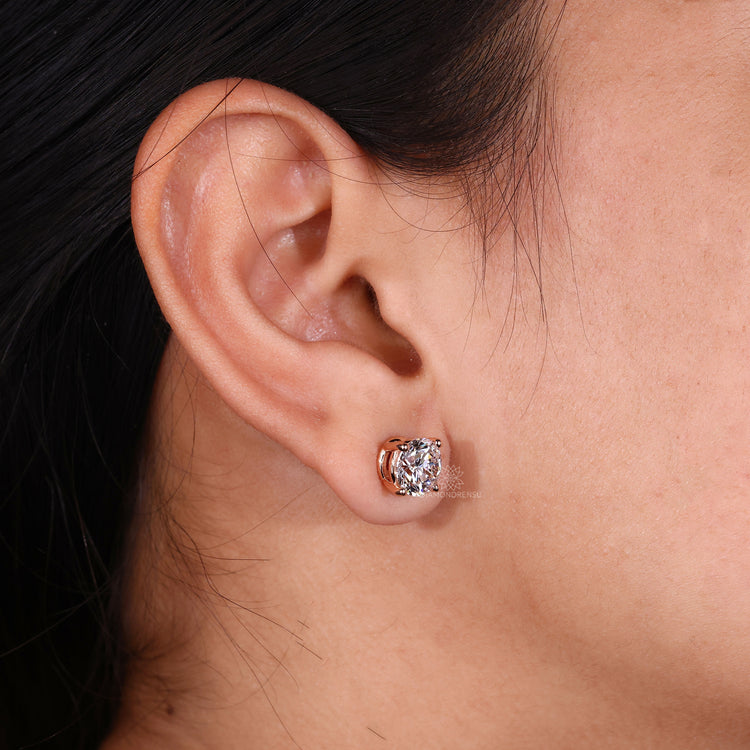 Rose gold push back diamond earrings.