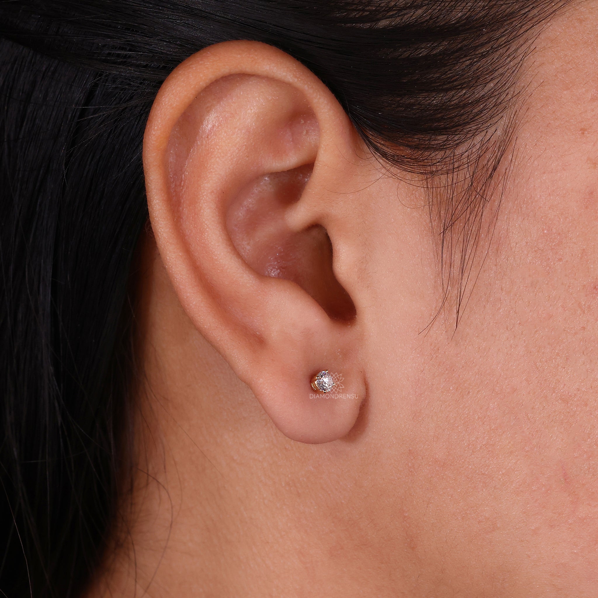Handmade yellow gold diamond earrings.