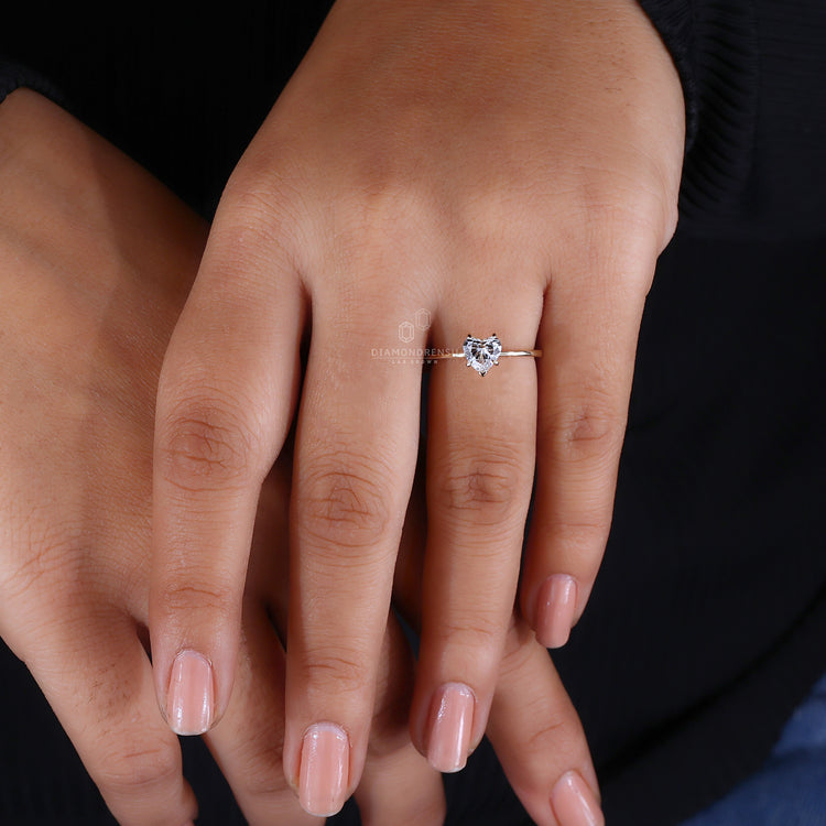 Yellow gold engagement ring heart cut.