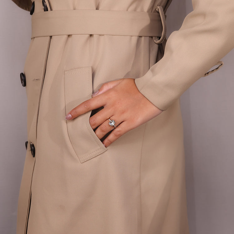 Basket setting ring with tapered baguette accents.