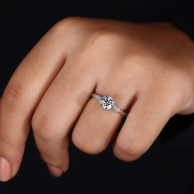 Octagon diamond with round cut side stones.