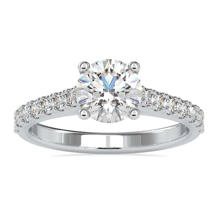 Round brilliant cut diamond ring in white gold with four prong setting.