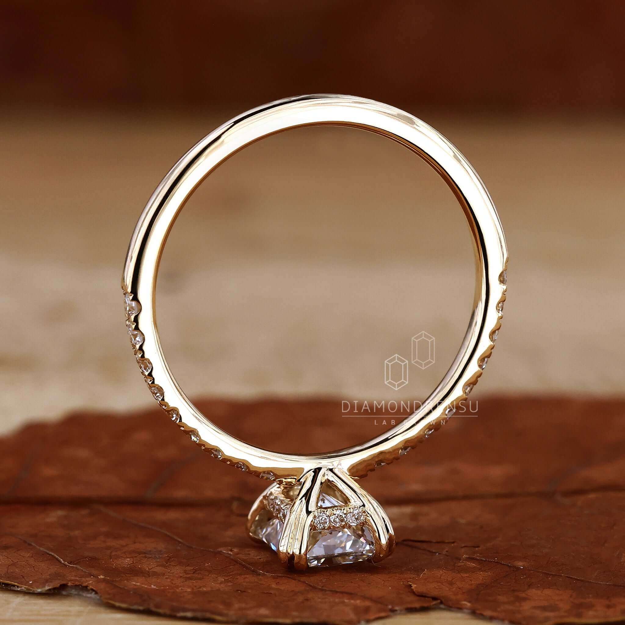 Radiant cut ring featuring a hidden halo engagement ring design.