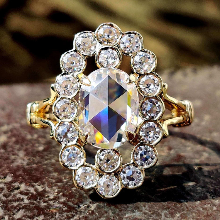 Oval rose cut ring in yellow gold.