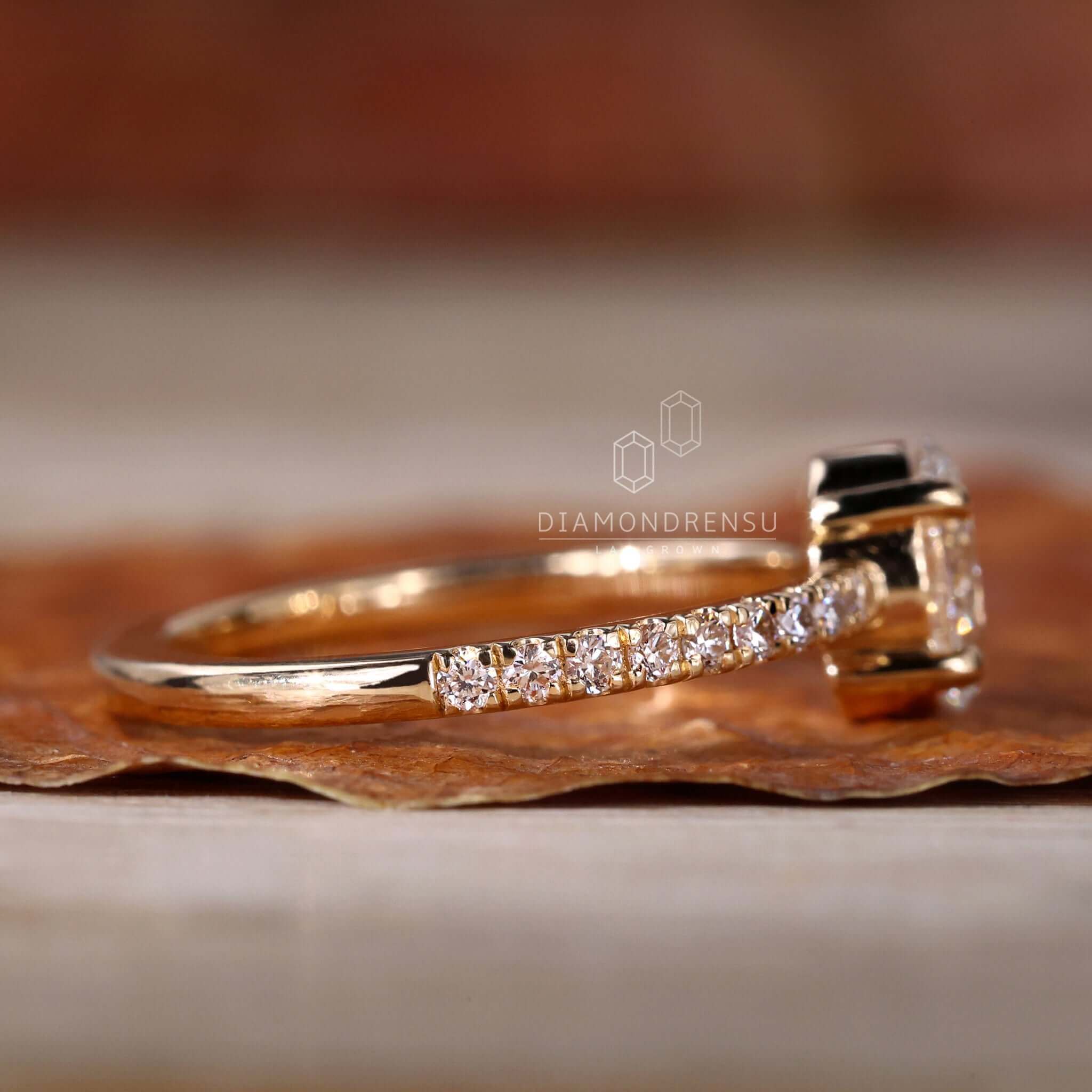 Engagement ring gold with pave details, perfect for women who love unique and sophisticated jewellery.