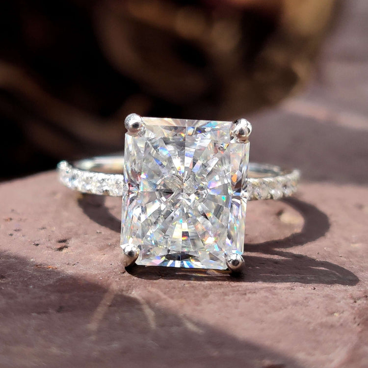 Radiant cut moissanite engagement ring in white gold.
