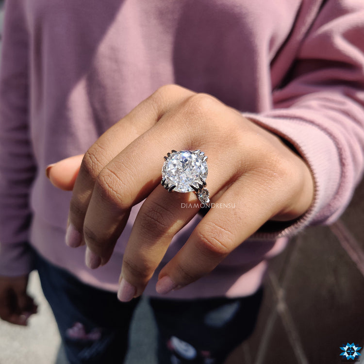 Handmade jewellery featuring Portuguese cut centre and moissanite side stones.