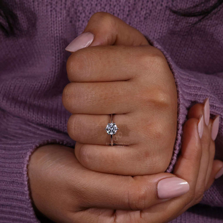 Brilliant cut diamond set in a 6 prong engagement ring, perfect for women who love unique engagement ring designs.