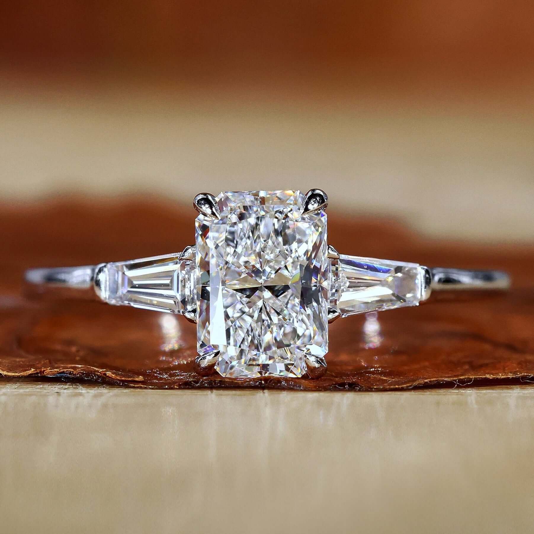 Radiant engagement ring with a classic claw prong setting.