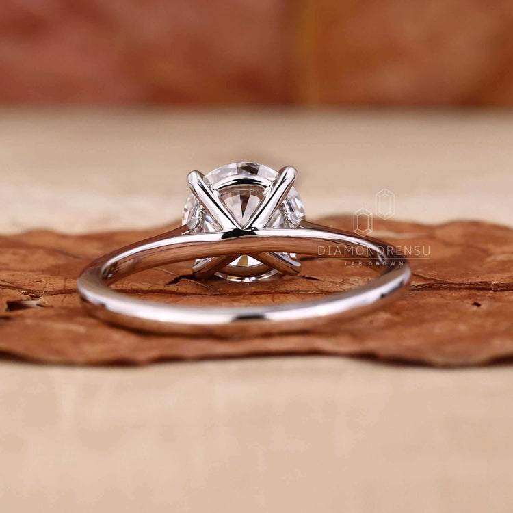 Solitaire engagement ring diamond with a round brilliant ring, perfect for women seeking a simple proposal ring.