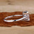 Elegant tapered baguette engagement ring set in a basket setting Elegant tapered baguette engagement ring set in a basket setting