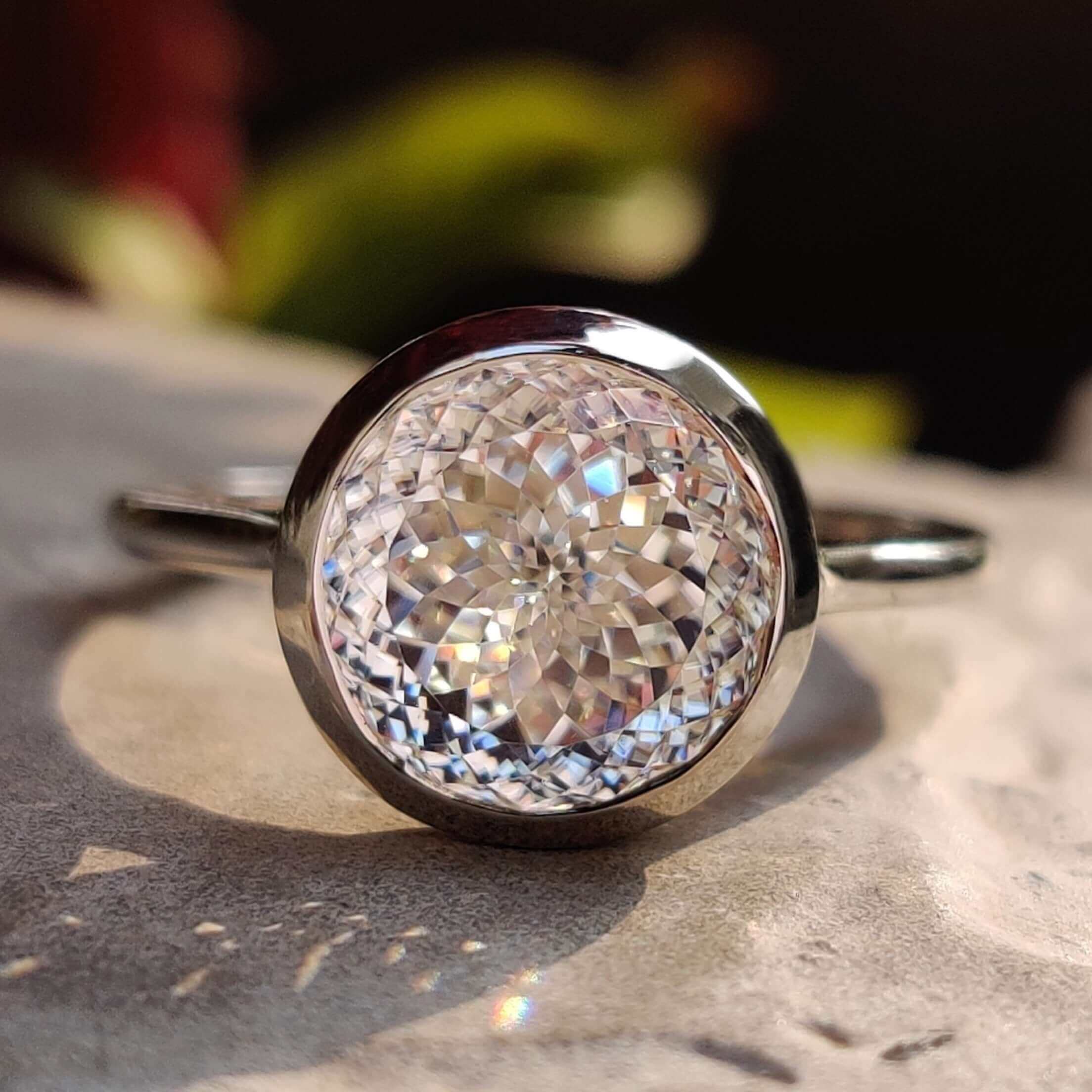 Portuguese cut moissanite solitaire ring in white gold.
