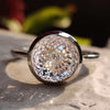Portuguese cut moissanite solitaire ring in white gold.