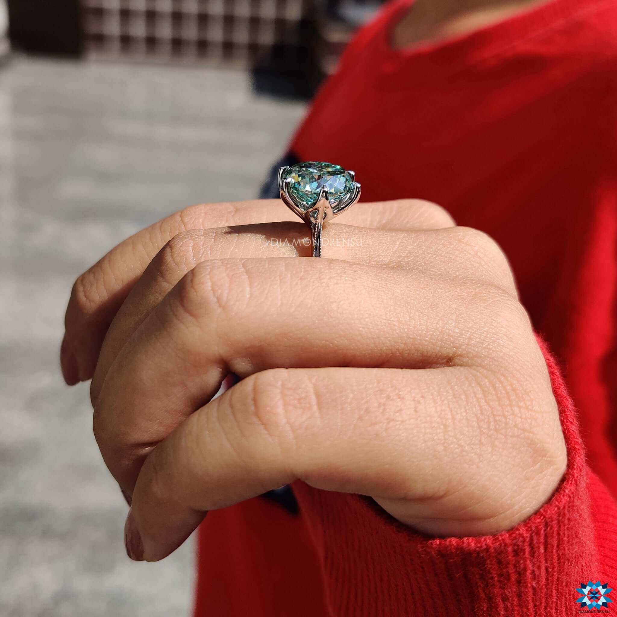 Custom moissanite ring with Portuguese cut stone.