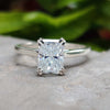 Radiant cut moissanite engagement ring in white gold.
