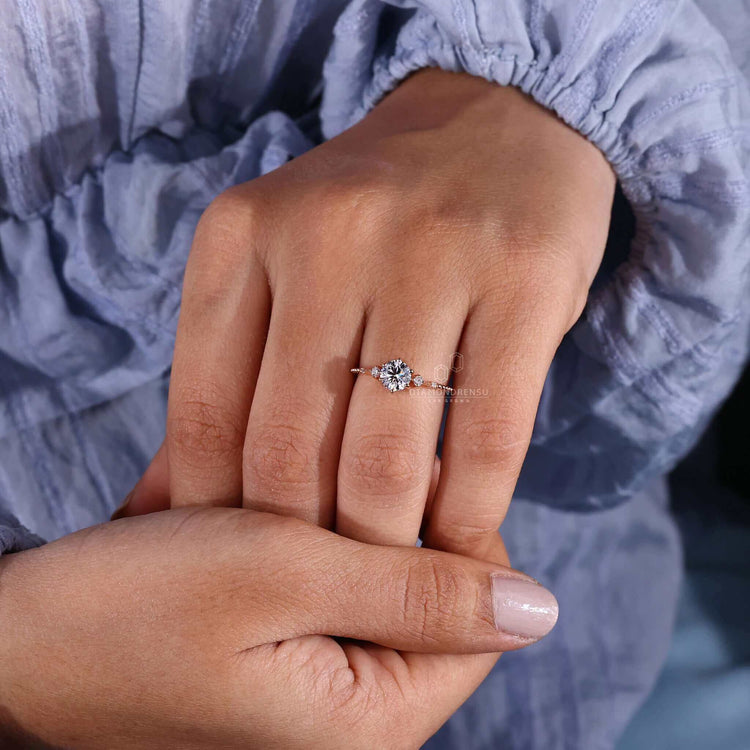 Round cut diamond ring featuring handmade jewellery, ideal for a unique engagement ring that combines tradition and modernity.