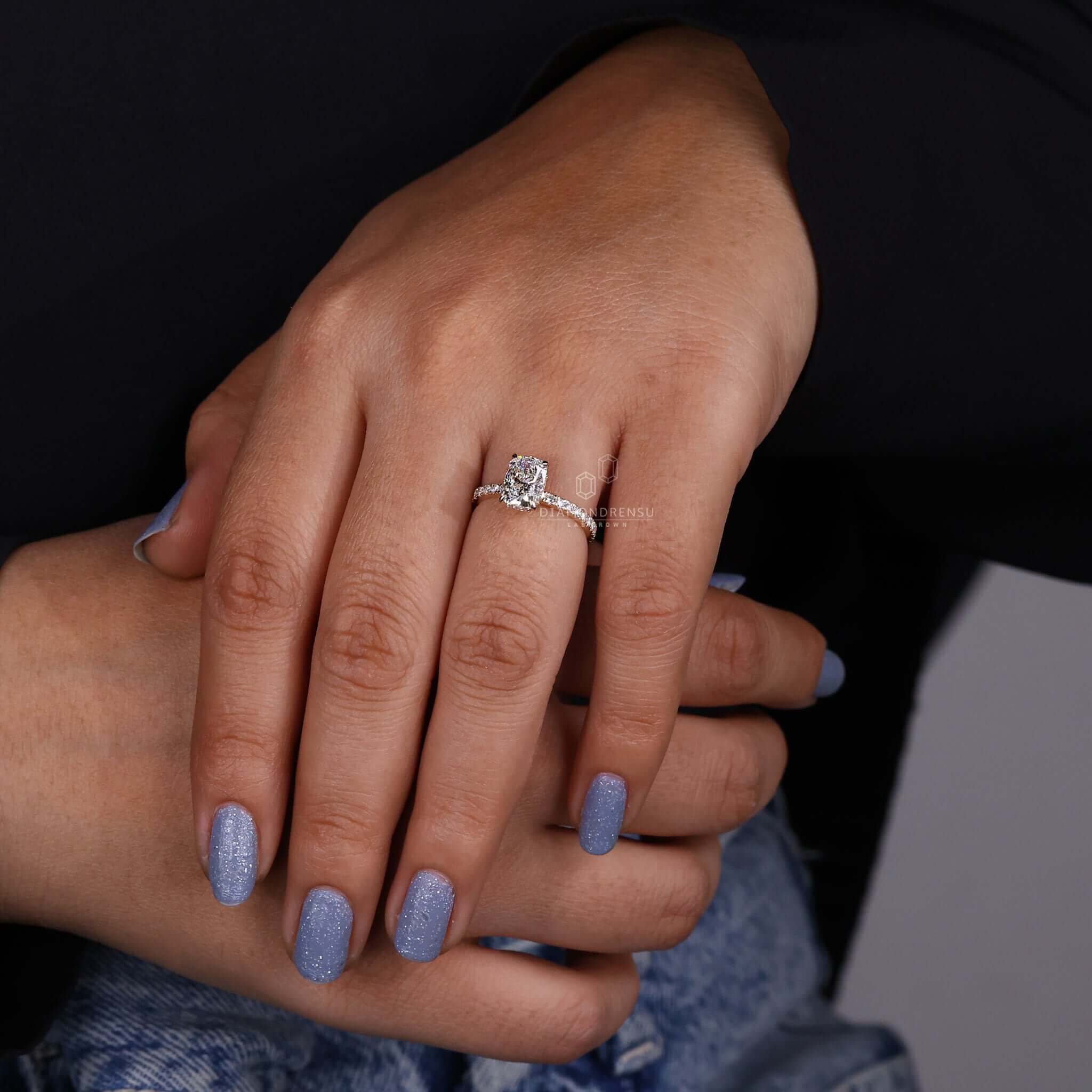 Gold pave ring with a stunning elongated cushion cut ring design.