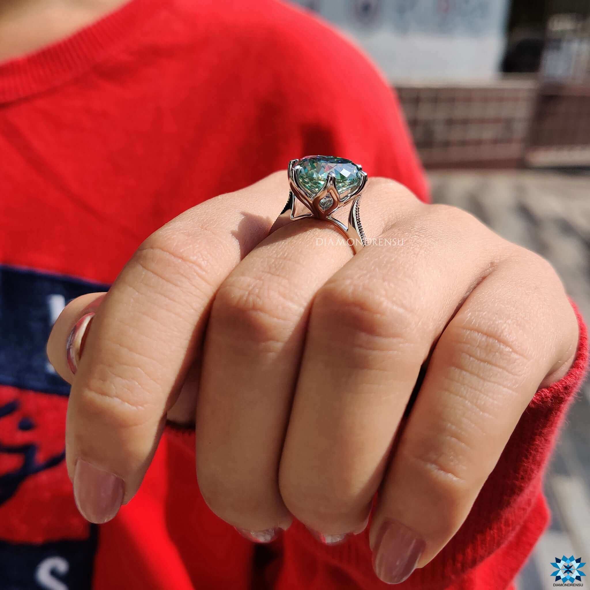 Yellow gold cathedral setting engagement ring.